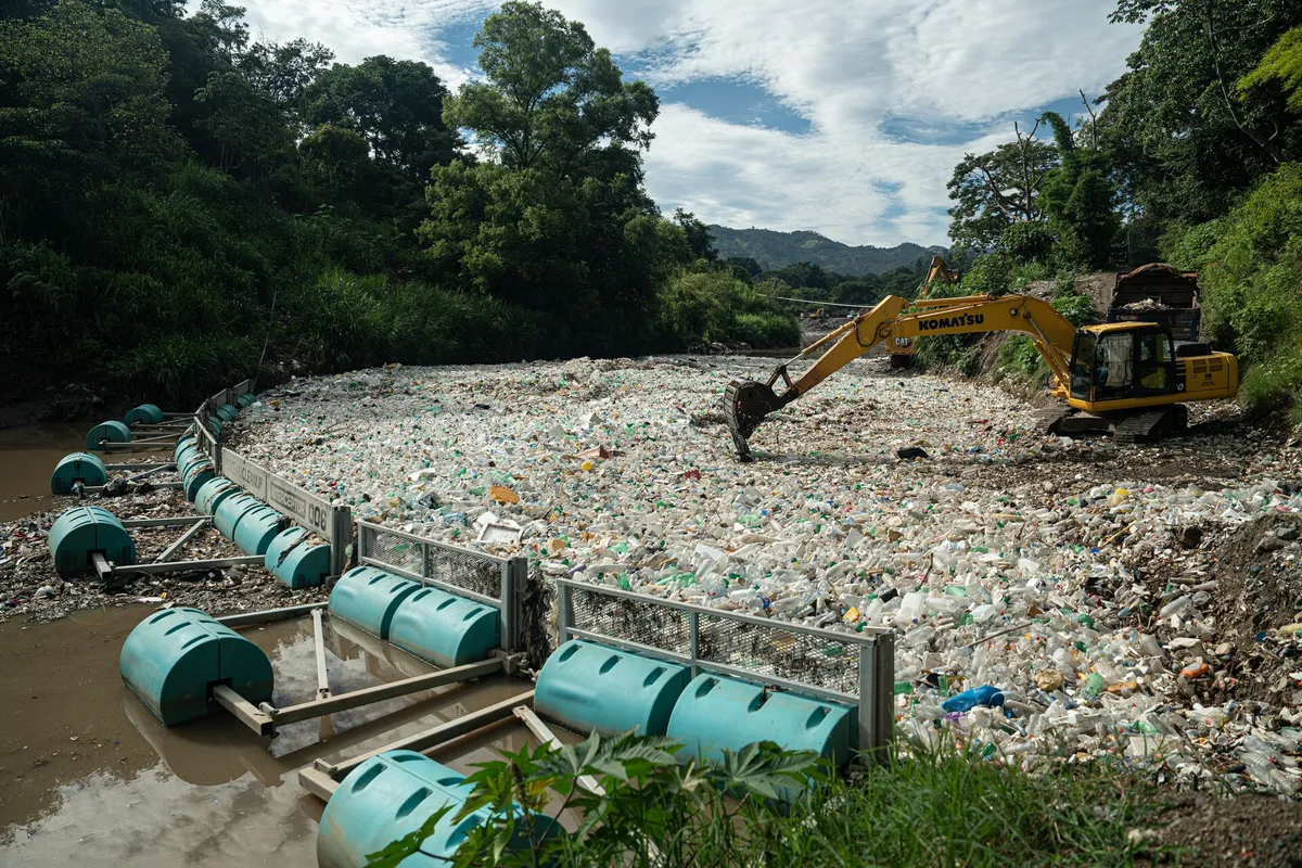 The River Interceptor Barricade by the Ocean Cleanup Project stops the flow of garbage into the ocean.